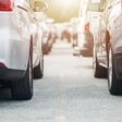 Public Parking Full of Cars Ground Level Close Up. Automotive and Transportation Concept. Parking Space Problem.
