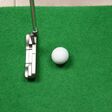 Office golf - golf ball and putter