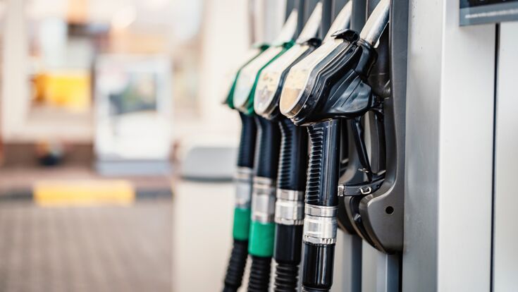 © alexanderuhrin - stock.adobe.com Closeup of woman pumping gasoline fuel in car at gas station. Petrol or gasoline being pumped into a motor. Transport concept