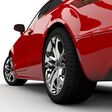 3D rendering of a red car on a white background