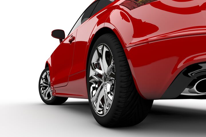 3D rendering of a red car on a white background