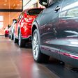 blur view of row new modern car in showroom