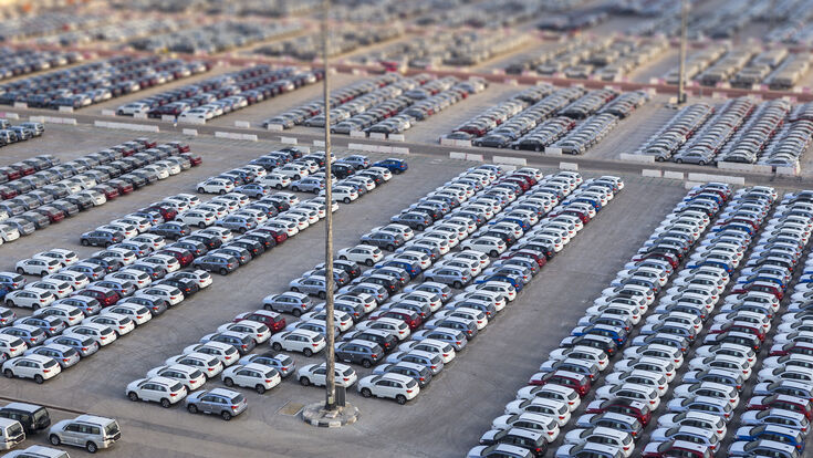 © Sergey Kelin - stock.adobe.com auto automobile automotive business car cars dealer dealership dubai fleet line lot many market new park parked red row rows sale traffic transport transportation uae used vehicle white