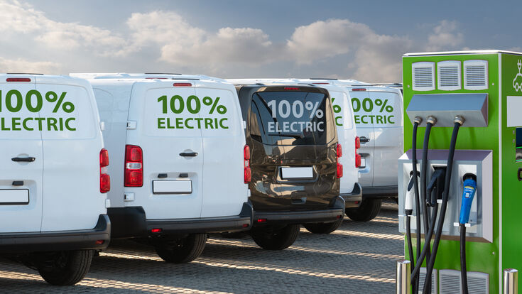 © scharfsinn86 - stock.adobe.com fleet electric van green transport charging station transportation cargo delivery car vehicle shipping industry business logistic trucking clean energy zero emission charge renewable energy power technology socket cable bus low emissions zero waste clean mobility mobility powered powered by decarbonisation decarbonising ecology ecological low sustainability sustainable