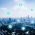 5G network wireless systems and internet of things with modern city skyline